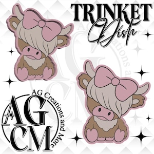 May include: A trinket dish design featuring two cartoon Highland cows with pink bows and a light brown and tan color scheme. The words "TRINKET Dish" are written in black script. The logo "AG Creations and More" is also visible.