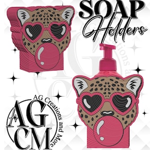 Könnte beinhalten: Ein Set aus drei Keramikbechern mit gesprenkelter, matter Oberfläche. Die Becher sind in Creme-, Hellgrau- und Dunkelgrautönen gehalten. Jeder Becher hat ein schlichtes, minimalistisches Design.