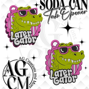 May include: A green alligator wearing pink sunglasses and a pink frame, with the text "Later Gator". The words "SODA CAN Tab Opener" are above the alligator. The logo "AG Creations and More" is also present.