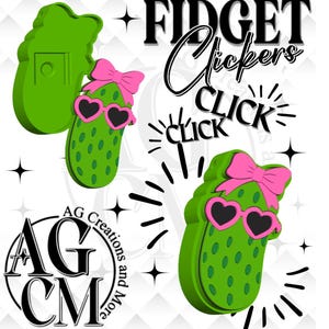 Puede incluir: Juguetes fidget en forma de pepinillo verde con lazos rosas y gafas de sol en forma de corazón. La imagen incluye el texto "FIDGET Clickers" y "CLICK CLICK". También está presente el logotipo "AG Creations and More".