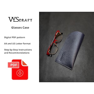 May include: A digital PDF pattern for a glasses case. The pattern is available in A4 and US Letter format. The image shows a pair of red and gold glasses and a dark blue glasses case.