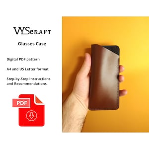 May include: A brown leather glasses case with a black interior, held against a yellow background. The case is stitched along the edges. Text on the left reads "WYSCRAFT Glasses Case Digital PDF pattern A4 and US Letter format Step-by-Step Instructions and Recommendations".