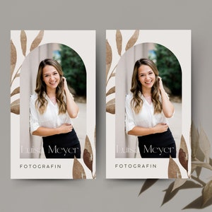 May include: Two white cards with a brown watercolor design featuring leaves and an archway. The cards have a photo of a woman smiling in the archway. The text "Louisa Meyer FOTOGRAFIN" is printed on the bottom of each card.