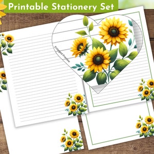 May include: Printable stationery set featuring a heart-shaped design with sunflowers and green leaves. The set includes lined paper and a blank card with a sunflower border.