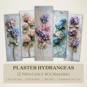 May include: Five rectangular art prints featuring textured plaster hydrangea flowers in shades of pink, purple, and blue. Each print measures approximately 5 x 15 cm. The prints are on a textured, off-white background.