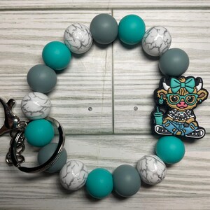 Pulsera de cuentas de vaca turquesa con clip para llavero