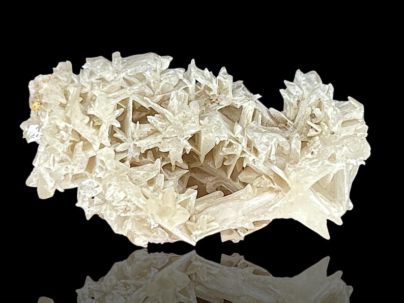 Rare Snowflake Cerussite Crystal cluster – A stunning raw mineral Cerussite specimen featuring intricate reticulated crystal formations. This unique natural gemstone is perfect for collectors and those seeking distinctive rock and stone pieces. Its delicate snowflake-like pattern and captivating natural beauty make it an ideal addition to home decor, meditation spaces, or crystal healing collections. A rare and beautiful piece, showcasing nature's artistry in every detail.