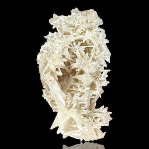 Rare Snowflake Cerussite Crystal cluster – A stunning raw mineral Cerussite specimen featuring intricate reticulated crystal formations. This unique natural gemstone is perfect for collectors and those seeking distinctive rock and stone pieces. Its delicate snowflake-like pattern and captivating natural beauty make it an ideal addition to home decor, meditation spaces, or crystal healing collections. A rare and beautiful piece, showcasing nature's artistry in every detail.
