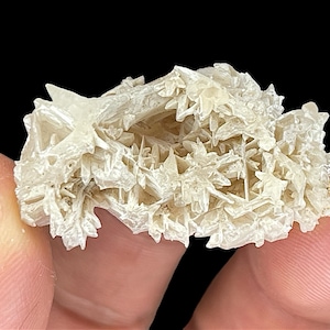 Rare Snowflake Cerussite Crystal cluster – A stunning raw mineral Cerussite specimen featuring intricate reticulated crystal formations. This unique natural gemstone is perfect for collectors and those seeking distinctive rock and stone pieces. Its delicate snowflake-like pattern and captivating natural beauty make it an ideal addition to home decor, meditation spaces, or crystal healing collections. A rare and beautiful piece, showcasing nature's artistry in every detail.