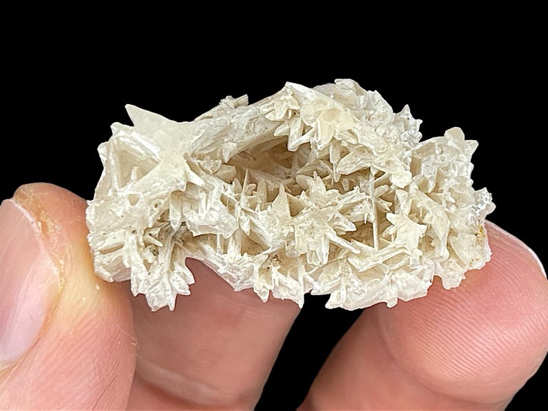Rare Snowflake Cerussite Crystal cluster – A stunning raw mineral Cerussite specimen featuring intricate reticulated crystal formations. This unique natural gemstone is perfect for collectors and those seeking distinctive rock and stone pieces. Its delicate snowflake-like pattern and captivating natural beauty make it an ideal addition to home decor, meditation spaces, or crystal healing collections. A rare and beautiful piece, showcasing nature's artistry in every detail.