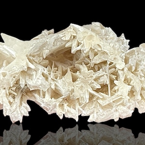Rare Snowflake Cerussite Crystal cluster – A stunning raw mineral Cerussite specimen featuring intricate reticulated crystal formations. This unique natural gemstone is perfect for collectors and those seeking distinctive rock and stone pieces. Its delicate snowflake-like pattern and captivating natural beauty make it an ideal addition to home decor, meditation spaces, or crystal healing collections. A rare and beautiful piece, showcasing nature's artistry in every detail.