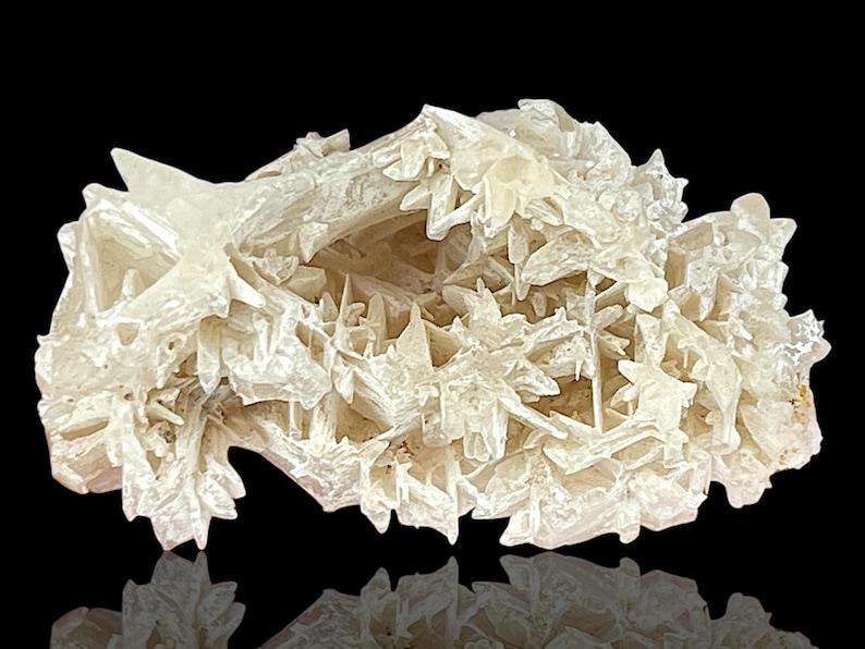 Rare Snowflake Cerussite Crystal cluster – A stunning raw mineral Cerussite specimen featuring intricate reticulated crystal formations. This unique natural gemstone is perfect for collectors and those seeking distinctive rock and stone pieces. Its delicate snowflake-like pattern and captivating natural beauty make it an ideal addition to home decor, meditation spaces, or crystal healing collections. A rare and beautiful piece, showcasing nature's artistry in every detail.
