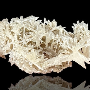 Rare Snowflake Cerussite Crystal cluster – A stunning raw mineral Cerussite specimen featuring intricate reticulated crystal formations. This unique natural gemstone is perfect for collectors and those seeking distinctive rock and stone pieces. Its delicate snowflake-like pattern and captivating natural beauty make it an ideal addition to home decor, meditation spaces, or crystal healing collections. A rare and beautiful piece, showcasing nature's artistry in every detail.