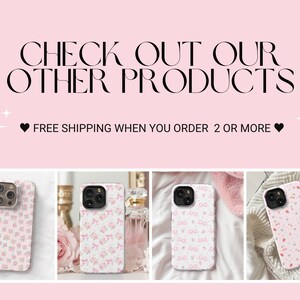 May include: Four different iPhone cases with pink floral patterns. The cases feature a variety of floral designs, including bows, strawberries, and small flowers. The text "CHECK OUT OUR OTHER PRODUCTS" and "FREE SHIPPING WHEN YOU ORDER 2 OR MORE" is displayed above the cases.