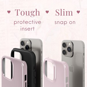 May include: Two phone cases, one black and one pink, are shown with the text "Tough protective insert" and "Slim snap on" above them. The black case is a two-piece design with a hard outer shell and a soft inner liner. The pink case is a single-piece design and is made of a flexible material.