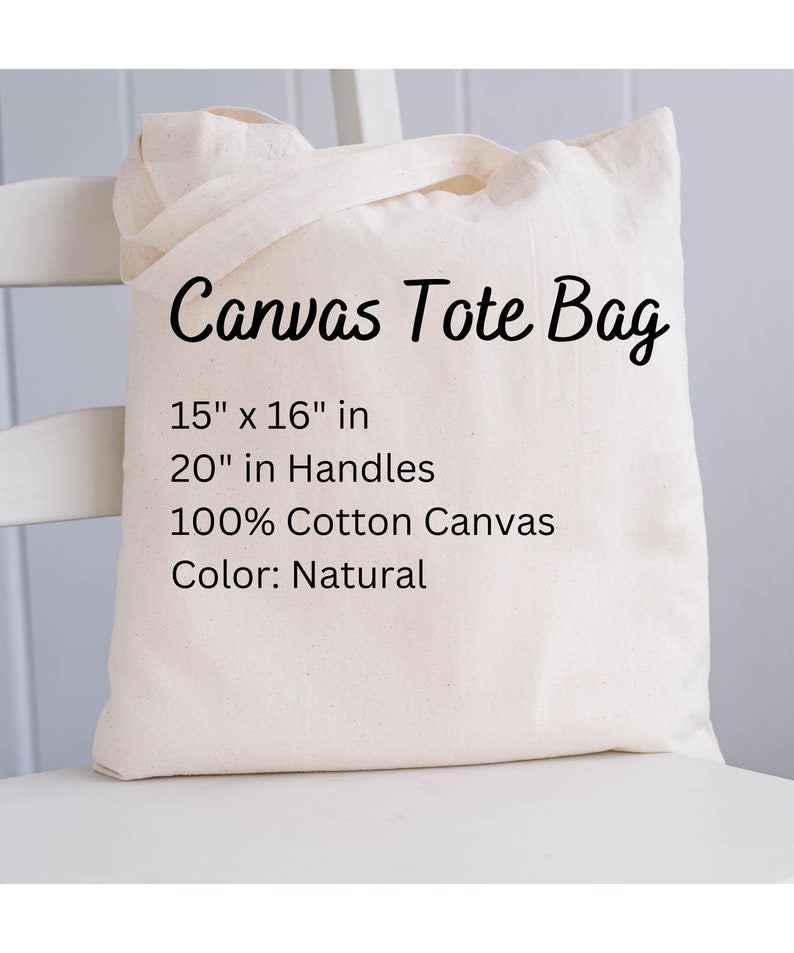 以下が含まれることがあります： ナチュラルカラーのキャンバス地のトートバッグ。黒い文字で「Canvas Tote Bag」、「15" x 16" in」、「20" in Handles」、「100% Cotton Canvas」、「Color: Natural」と書いてあります。
