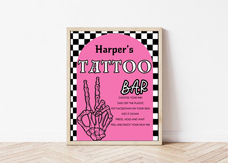 May include: A pink and black sign with the text "Harper's Tattoo Bar" and instructions for using temporary tattoos. The sign features a black and white checkered background and a skeleton hand making a peace sign.