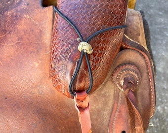 Rope holder, rope keeper, rope holder for saddle
