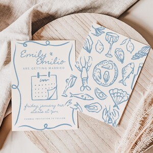 Plantilla para guardar la fecha de una boda de destino con temática costera en azul y blanco, ilustración caprichosa de ostras dibujada a mano y diseño de playa editable