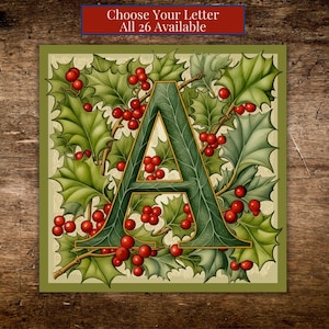 May include: A decorative letter "A" with a holly and berry design. The letter is green with a gold outline, surrounded by green holly leaves and red berries. The text "Choose Your Letter All 26 Available" is at the top.
