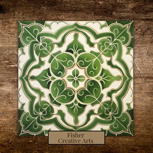 May include: Square ceramic tile with a green and white floral design. The tile features a symmetrical pattern of stylized leaves and vines, with gold accents. The text "Fisher Creative Arts" is displayed on a rectangular label at the bottom.