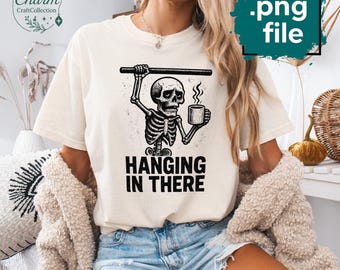 Hanging in there PNG, Funny Skeleton Quote Sublimation, Sarcastic Dark Humor Design, Snarky Spooky Skeleton Shirt PNG, Sassy Trending Png