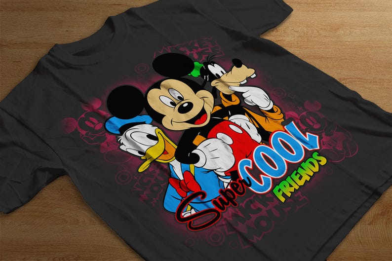 May include: Black t-shirt with a colorful graphic of Mickey Mouse, Donald Duck, and Goofy. The text "Super Cool Friends" is printed on the shirt.
