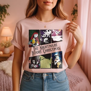 Puede incluir: Una camiseta rosa claro con un diseño gráfico de "Pesadilla antes de Navidad". El diseño incluye imágenes de personajes como Sally, Jack Skellington y Oogie Boogie. El texto "The Nightmare Before Christmas" está impreso debajo.