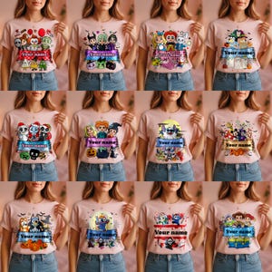 Puede incluir: Una colección de camisetas de color rosa claro con varios diseños de personajes de dibujos animados y el texto "Your name" en una pancarta. Los diseños incluyen temas de Halloween y Disney, con personajes como Jack Skellington.