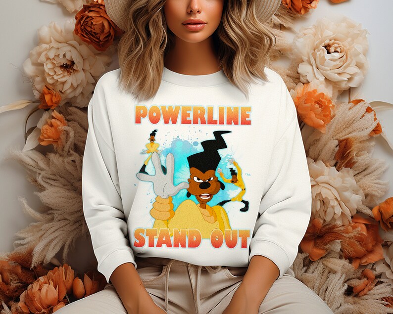 May include: White sweatshirt with a cartoon dog character wearing a yellow shirt and the text "POWERLINE STAND OUT" in orange and yellow.