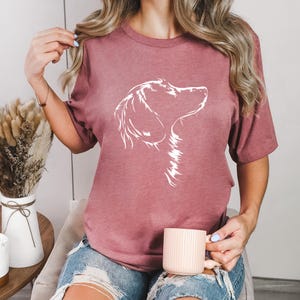 Soft Bella Canvas tee with a flowing Longhaired Dachshund silhouette. A must-have for Dackel fans who adore elegant wiener dogs