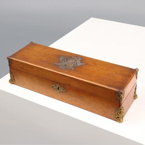 French Antique wooden box with decorative metal ornaments and fittings, ca. 1900