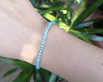 Blue Topaz Rondelle Bracelet: December Birthstone, Sterling Silver