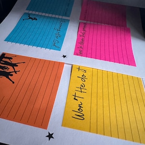 May include: Printed sheets with colorful sticky notes. The notes have text like "Running after God" and "Time to claim that promise." The image includes a silhouette of a person running and a group of people celebrating.