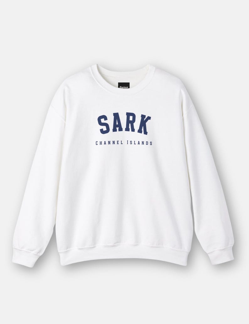 May include: White crewneck sweatshirt with a navy blue embroidered logo that says "SARK CHANNEL ISLANDS".