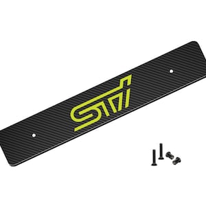 Peut inclure: Panneau en fibre de carbone noir avec le logo STI vert citron. Le panneau rectangulaire a des coins arrondis et deux trous pré-percés. Matériel de montage inclus.