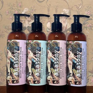Honey Dew botanical body serum shown in four botanical scents, intensive body moisturizer for dry and sensitive skin.