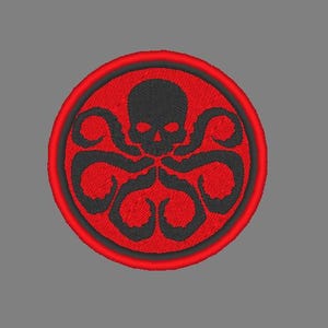 May include: Embroidered patch featuring a red circle with a black octopus-like design and a skull in the center. The patch has a red border and is set against a gray background. The design is detailed and appears to be machine-embroidered.