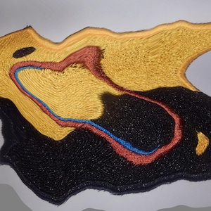 May include: A yellow, red, and blue embroidered patch with a black background. The patch has a unique, abstract design.