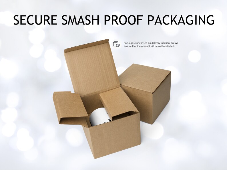 May include: Two brown cardboard boxes, one inside the other, with the top box open. The inner box contains a white mug. The text "SECURE SMASH PROOF PACKAGING" is at the top of the image. The text "Packages vary based on delivery location, but we ensure that the product will be well protected." is at the bottom of the image.