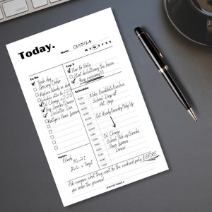 May include: A black and white printable daily planner with a to-do list, schedule, and notes section. The planner includes a list of tasks such as "Trash day", "Grocery Order", and "Declutter Den". The schedule section includes times from 7:00 AM to 7:00 PM. The notes section includes the text "Blinds 34x71" and "$44 @ Target".