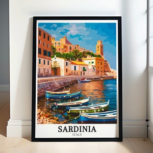 May include: A vintage travel poster featuring a colorful illustration of a harbor town in Sardinia, Italy. The poster features a picturesque view of colorful buildings, boats, and a clear blue sky. The text "Sardinia, Italy" is printed at the bottom of the poster.