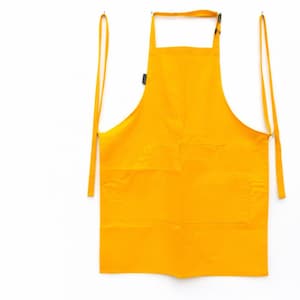 Unisex Yellow Cotton Bib Apron: Adjustable Neck, Pockets