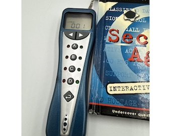 INTELLIQUEST Quizmo, juego electrónico portátil, libro de preguntas, agente secreto, VINTAGE RETRO