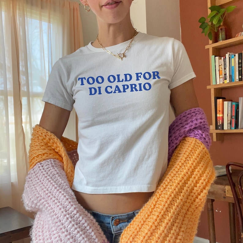 Too Old For DiCaprio Baby Tee, 90s / Y2K Style, 2000s Aesthetic, Cropped T-Shirt, Coquette, Iconic, Unhinged, Funny Meme Slogan image 1