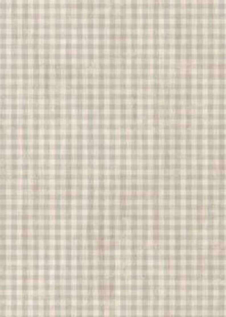 May include: A beige and white gingham fabric with a subtle texture. The fabric has a woven pattern of small squares.