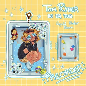 May include: A rectangular liquid shaker charm featuring an illustration of a character named Tom Ryder in a bathtub with bubbles and rubber ducks. The text reads Tom Ryder in da tub, liquid shaker charm, and preorder. The back shows sticky notes.