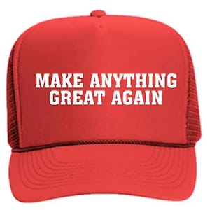 Puede incluir: Gorra de camionero roja con texto blanco "MAKE ANYTHING GREAT AGAIN". La gorra tiene una parte trasera de malla y una visera curva. El texto est&aacute; en negrita, sin serifa.