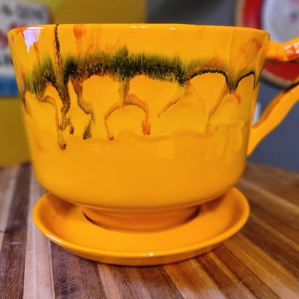 Vintage California Original cup and saucer planter.