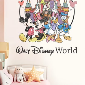 May include: A pink and white bedroom with a white bed and a pink bedspread. The wall has a large decal of Mickey Mouse, Minnie Mouse, Donald Duck, Goofy, and the Disney castle with the text "Walt Disney World".